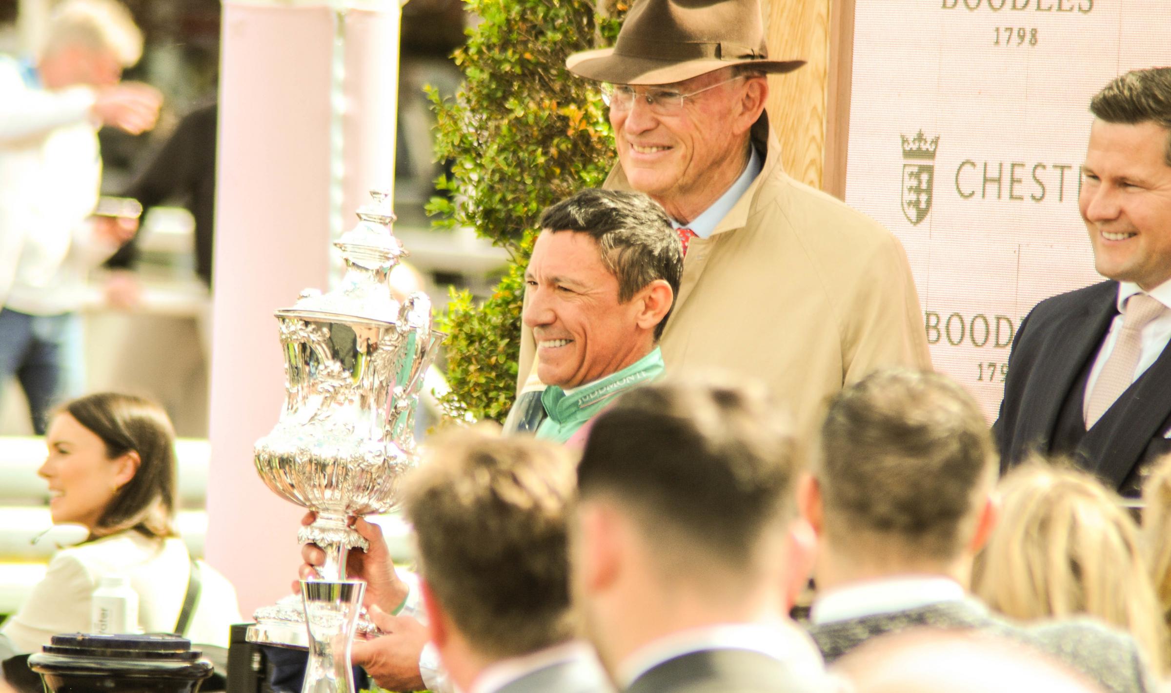 Chester Racecourse, Boodles May Festival City Day. Picture The Boodles Chester Vase Stakes (Class 1) Winning jockey Frankie Dettori holding the Chester Vase trophy. SW1052023.