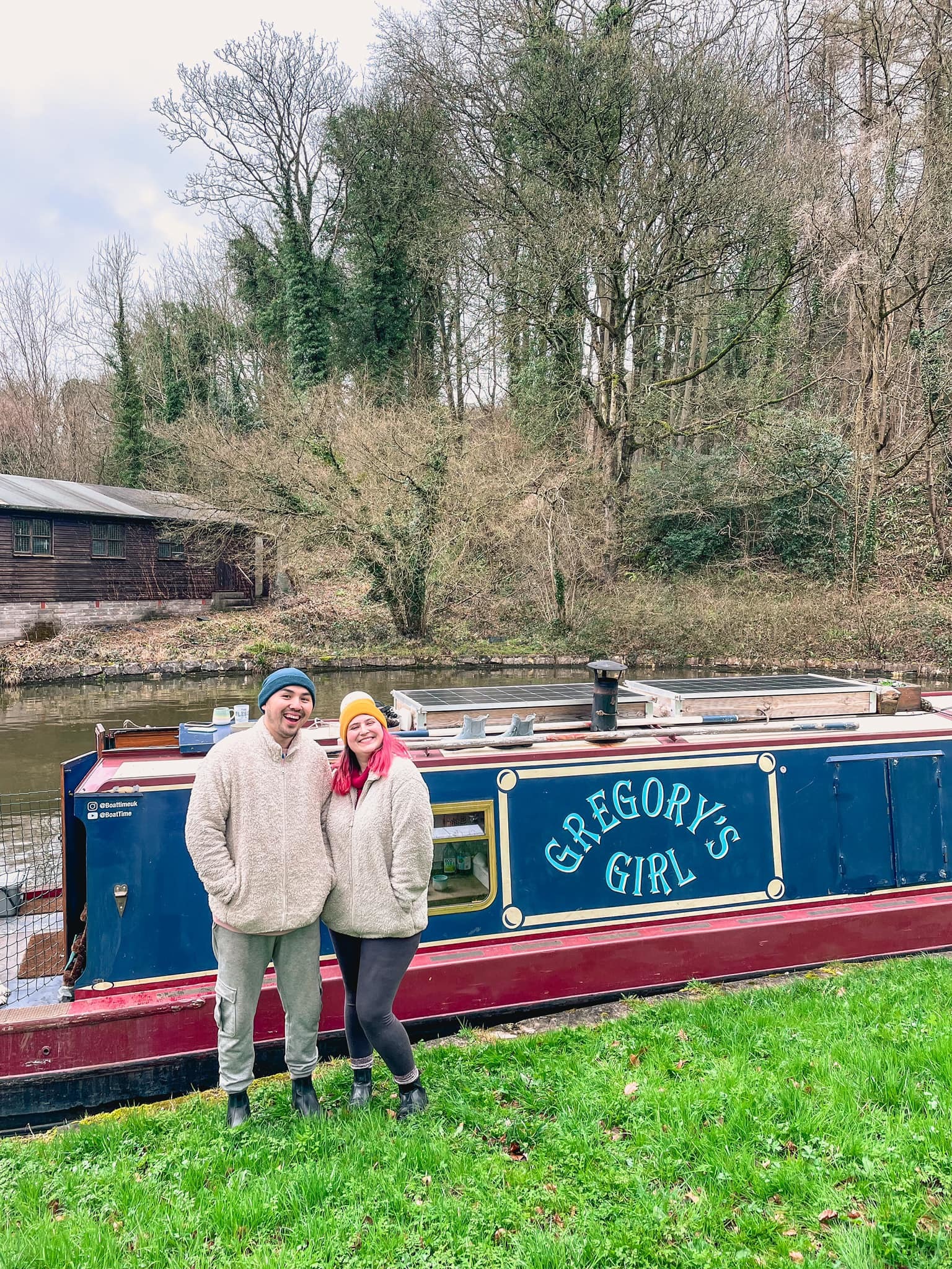 Wes and Amy by their boat. Image: SWNS