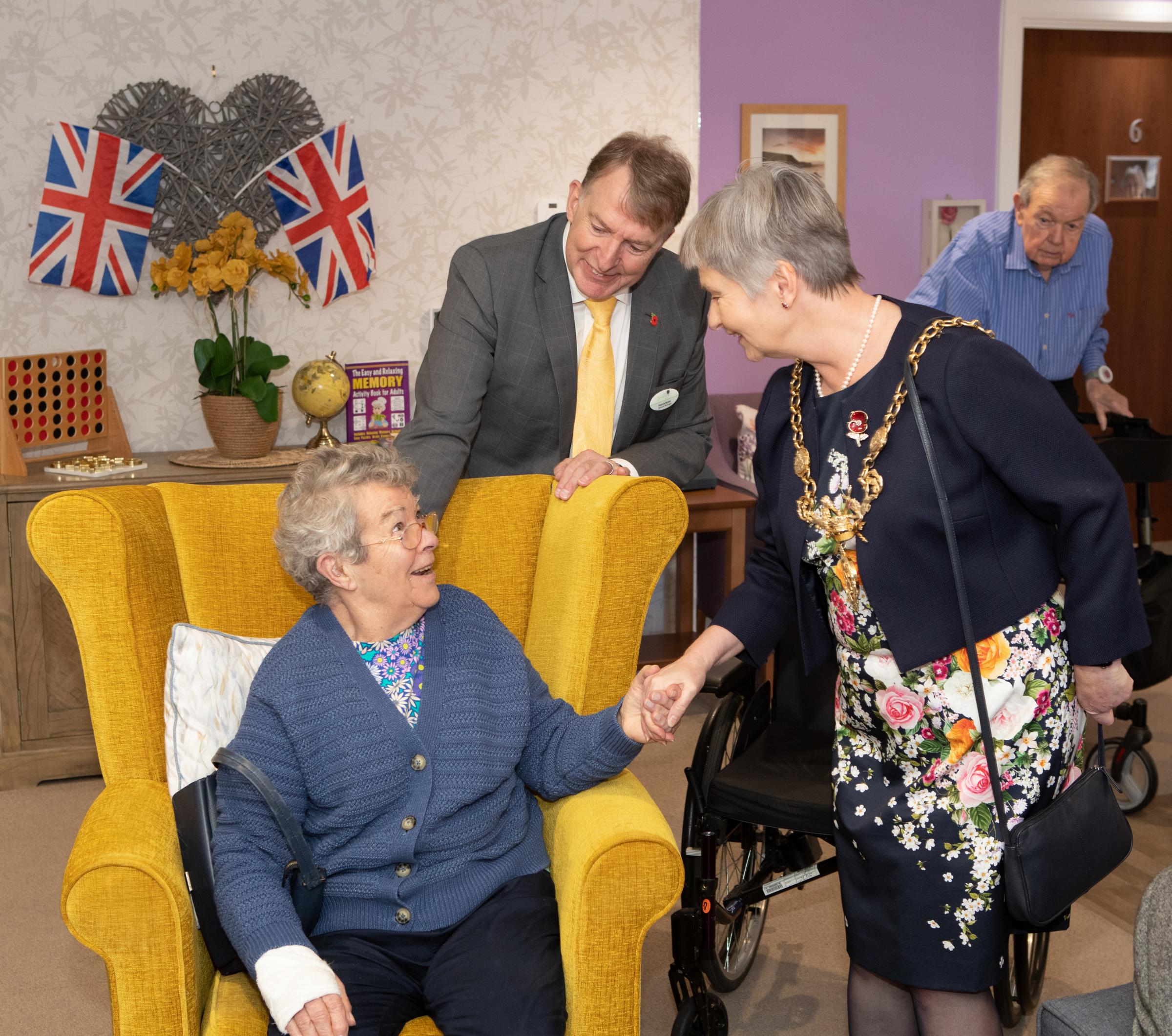 The Lord Mayor of Chester, Cllr Sheila Little (right), toured the village and met residents, including Barbara Harrison (left), with Belong Chester General Manager Patrick Butler (back).