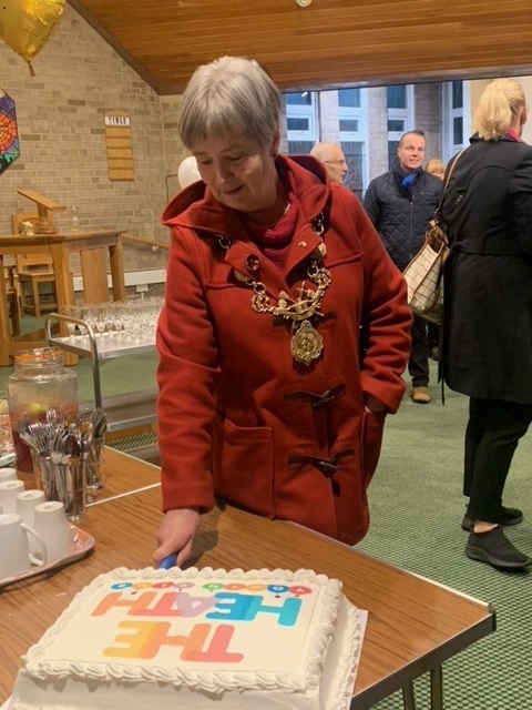 Lord Mayor of Chester Sheila Little cuts the cake.