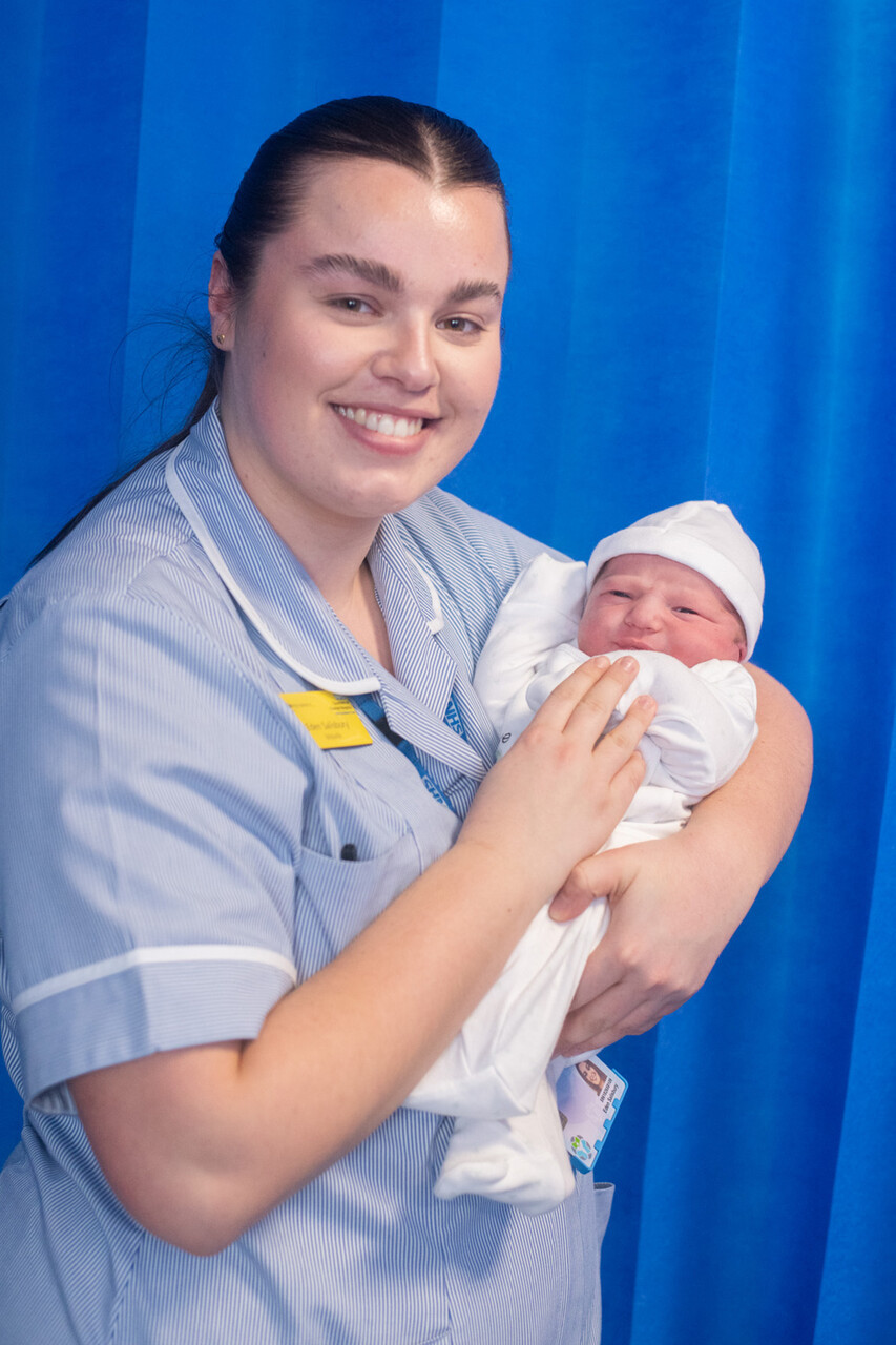 Baby Reuben was born on February 29, pictured with midwife Eden Salisbury. Picture: Countess of Chester Hospital.