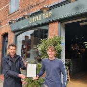 Edward Timpson MP presenting the award  to Myles Carr of the Little Tap in Tarporley.