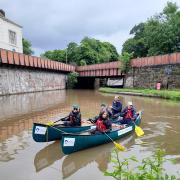 A group on weed patrol in the Shropshire Union Canal.