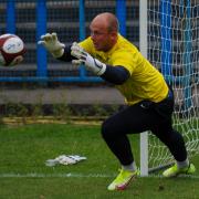 Town goalkeeper is suspended after retaliating to urine bottle swap incident