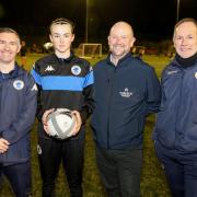 Harlech Foodservice are backing Chester Women Under-18s and pictured at training at Helsby are, from left, coach Bryson Kelso, joint top scorer Erin Parr, Harlech Account Manager David Roberts, and coach Rob Lawton.
