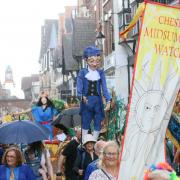 The Summer Watch Parade makes its way down Eastgate Street in the rain. (images: Welshie Dale via Facebook)