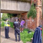 Police monitor offenders clearing graffiti vandalism on the Chester canal towpath. Picture: Cheshire Police Rural Crime Team.