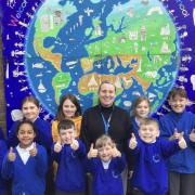 Pupils at Kingsley St John's Primary in Kingsley celebrated their recent Ofsted report with headteacher Rachel Jones.