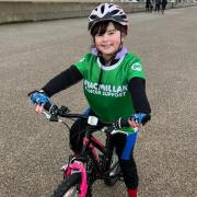 Nine year old girl completes 214 mile bike ride for two charities