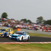 Ash Sutton and Jake Hill fight for victory at the Kwik Fit British Touring Car Championship round.