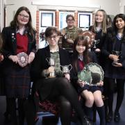 Music Festival winners and their trophies