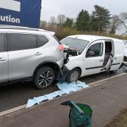 Three vehicles were involved in a collision near Ellesmere Port.