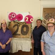 Staff and residents at Hillcrest Care Home celebrating the award.