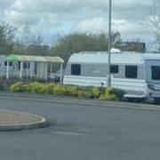 Travellers on land at Westbrook Centre opposite St Phillip Westbrook CofE Primary School