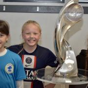 Players and families enjoyed their chance to be pictured with the Premier League trophy and the UEFA Women's Euro trophy at Chester FC Girls' Emerging Talent Centre.