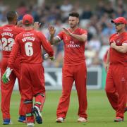 Lancashire Lightning's Jordan Clark (centre) celebrates after taking the wicket of Nottinghamshire Outlaws' Rikki Wessels during the T20 Blast match at Trent Bridge, Nottingham. PRESS ASSOCIATION Photo. Picture date: Saturday June 4, 2016. See PA